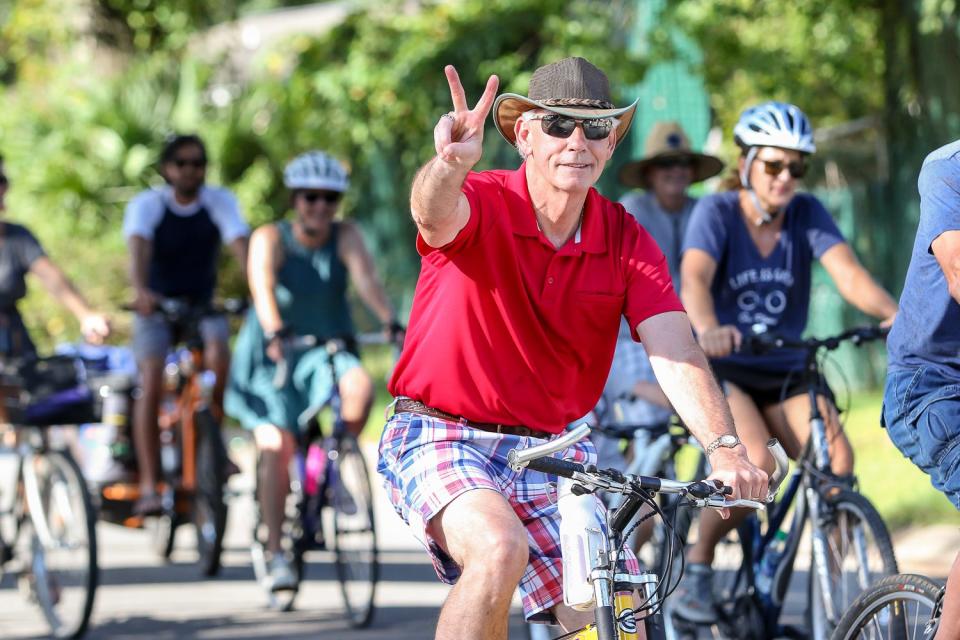 Hundreds of people participate in Bike Pensacola's September Slow Ride through East Hill on Sept. 22, 2018. Each month, with a police escort, bicyclists make their way through different neighborhoods, mostly within the city limits, for a relaxing group ride while also bringing awareness to bicycle safety and sharing the road with vehicles.