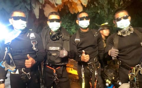 Dr Pak Loharachun was one of the final divers to emerge from the cave - Credit: AFP/AFP