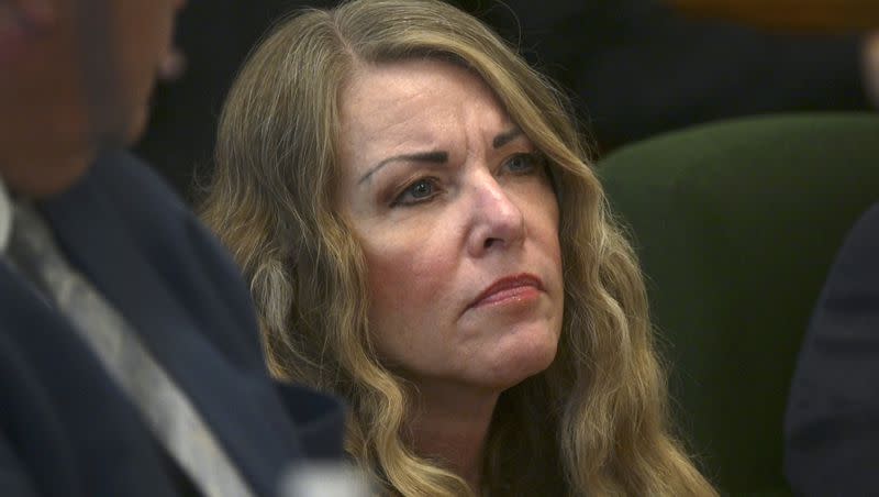 Lori Vallow Daybell sits during her sentencing hearing at the Fremont County Courthouse in St. Anthony, Idaho, July 31, 2023. On Wednesday, Oct. 25, 2023, an extradition warrant signed by Idaho Gov. Brad Little was delivered to other state officials, allowing Arizona officials to temporarily take custody of Daybell so she can face charges of conspiring to kill her estranged husband as well as her niece’s ex-husband.