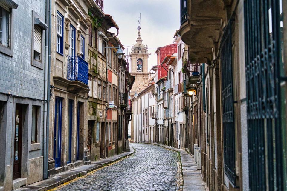 Curved cobblestone road in Old Town of Braga, Portugal