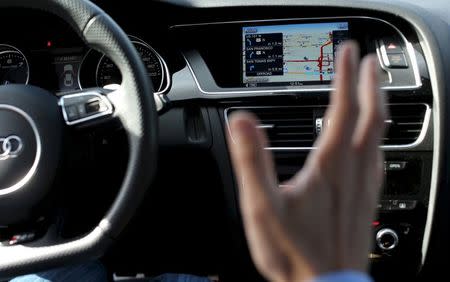 Nvidia's senior director of automotive business Danny Shapiro displays the electronic dashboard of an Audi automobile in Santa Clara, California, in this February 11, 2015 file photo. REUTERS/Robert Galbraith/Files