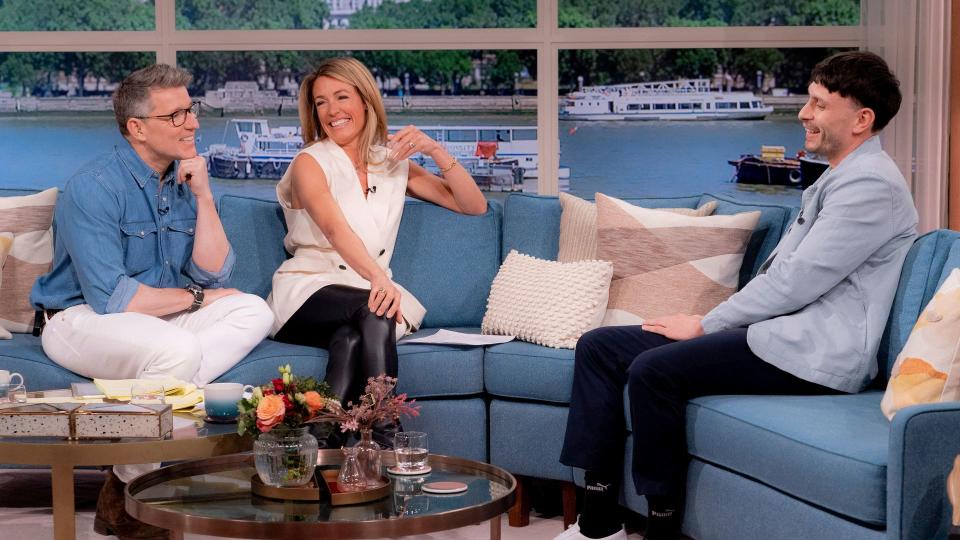 Cat on This Morning sofa with Ben Shephard and guest