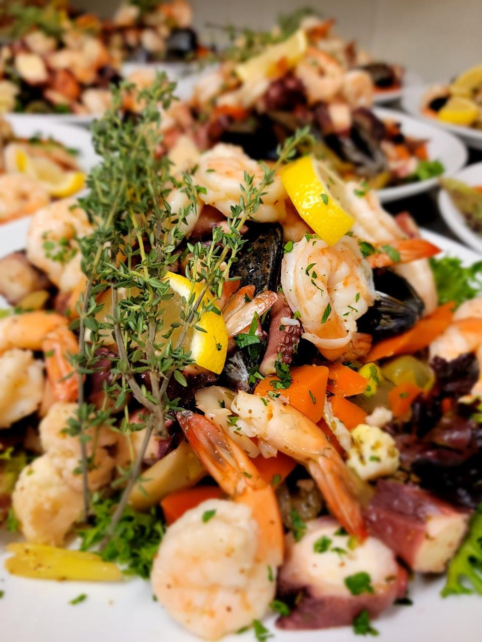 A dish from a past Feast of the Seven Fishes at Avellino in Sturbridge. This cold seafood salad with pickled vegetables is a popular starter during the feast.