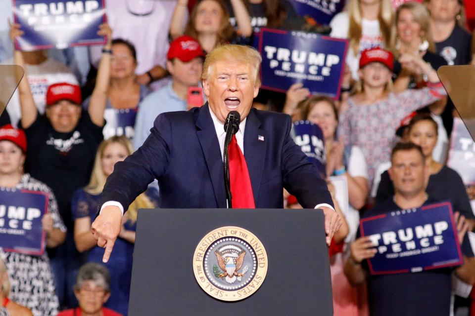 Trump supporters chanted 'send her back' as the president lashed out at Ms Omar (REUTERS)