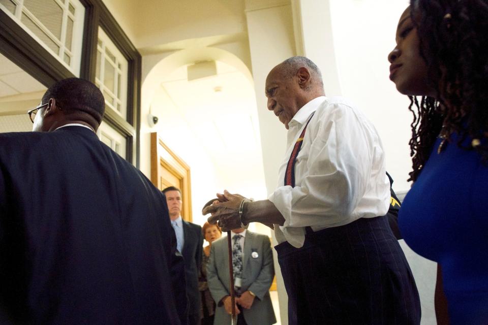 Cosby being taken into custody in handcuffs on Tuesday. (Photo: POOL via Getty Images)