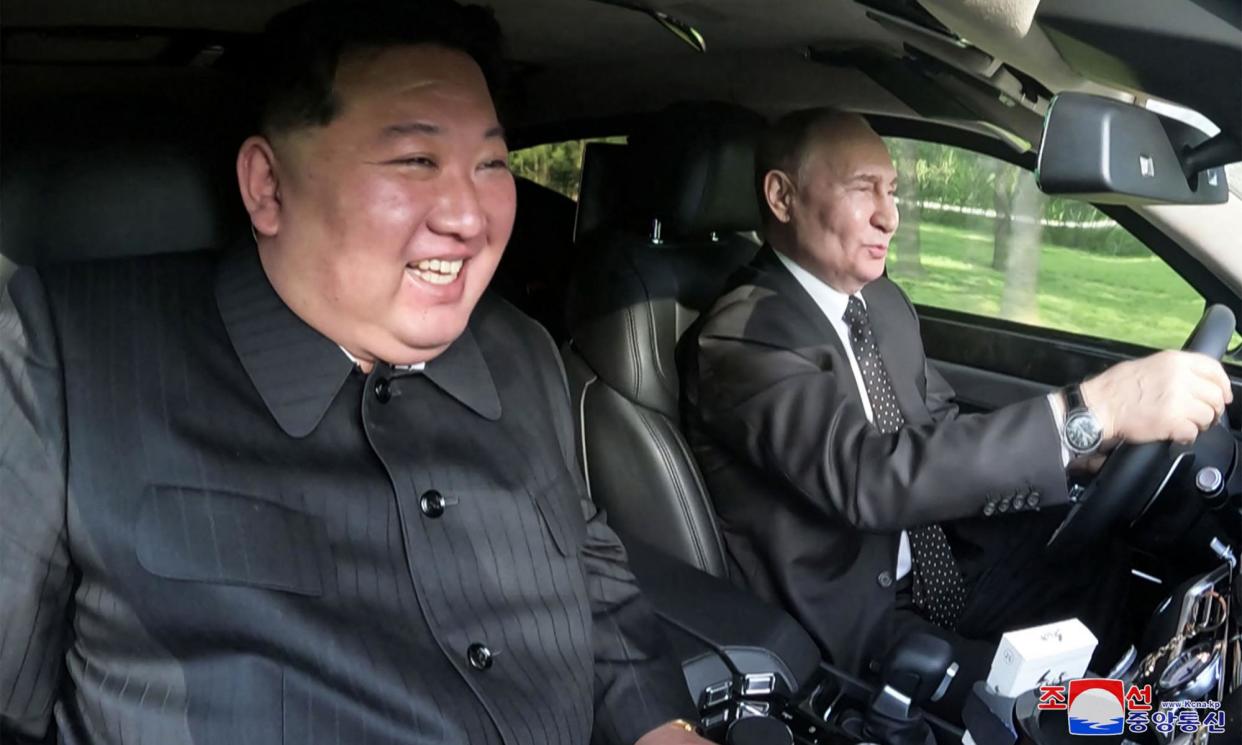 <span>Putin takes Kim out for a drive in a new Russian-built Aurus limousine during their summit.</span><span>Photograph: KCNA via KNS/AFP/Getty Images</span>