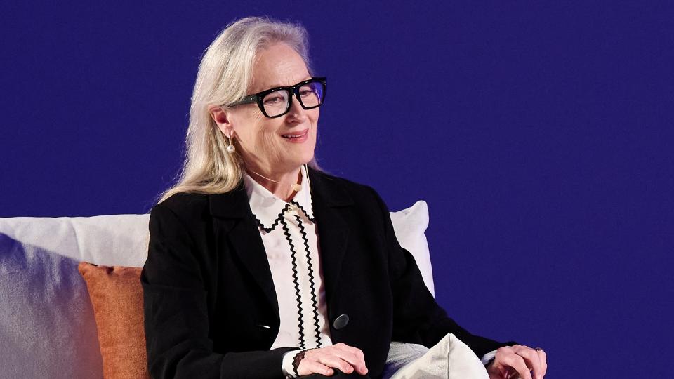 Actress Meryl Streep, with white hair and wearing a black blazer as she  attends the 'Sin Guion' conference during the Princesa de Asturias Awards 2023 at the Palacio de Congresos on October 18, 2023 in Oviedo, Spain