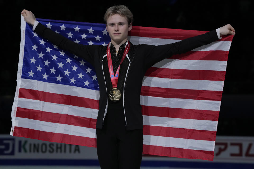 Gold medalist United States Ilia Malinin celebrate during the victory ceremony for the Men's Final in the ISU Grand Prix of Figure Skating Final held in Beijing, Saturday, Dec. 9, 2023. (AP Photo/Ng Han Guan)