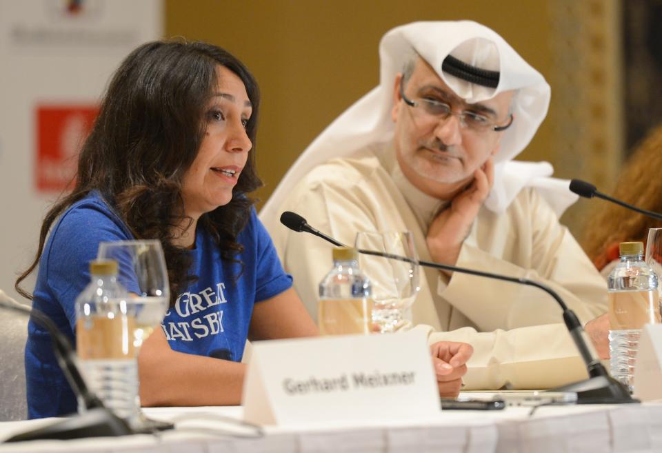 DUBAI, UNITED ARAB EMIRATES - DECEMBER 12: Director Haifaa Al Mansour and Artistic Director of DIFF Masoud Amralla Al Ali attend the "Wadjda" press conference during day four of the 9th Annual Dubai International Film Festival held at the Madinat Jumeriah Complex on December 12, 2012 in Dubai, United Arab Emirates. (Photo by Andrew H. Walker/Getty Images for DIFF)