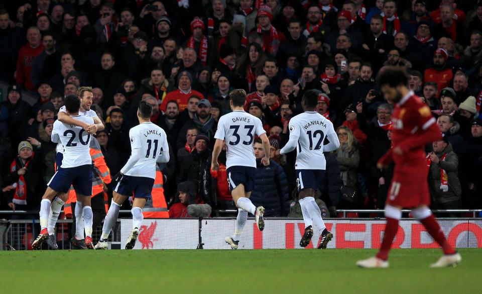 Kane celebrates his late equaliser to silence the Kop