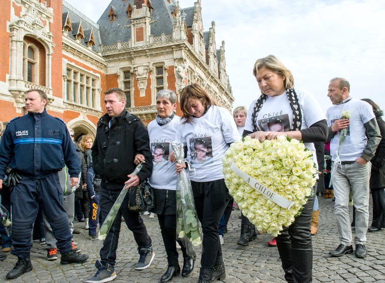 The Mayor of Calais, Natacha Bouchart (R), the mother (C) of Chloe, and relatives take part in a march on April 16, 2015 in Calais