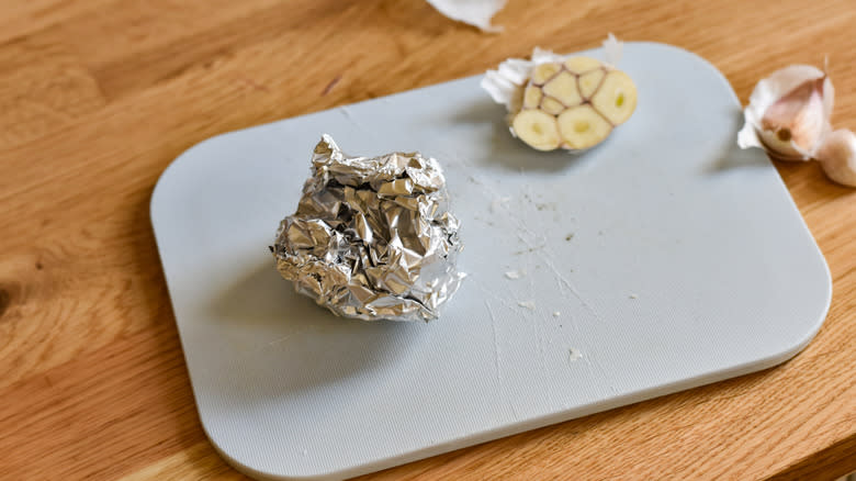 wrapping garlic in aluminum foil