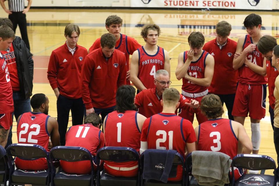 Former Walnut Grove coach Darin Meinders, middle, is aiming for three national straight championships at Baptist Bible College.