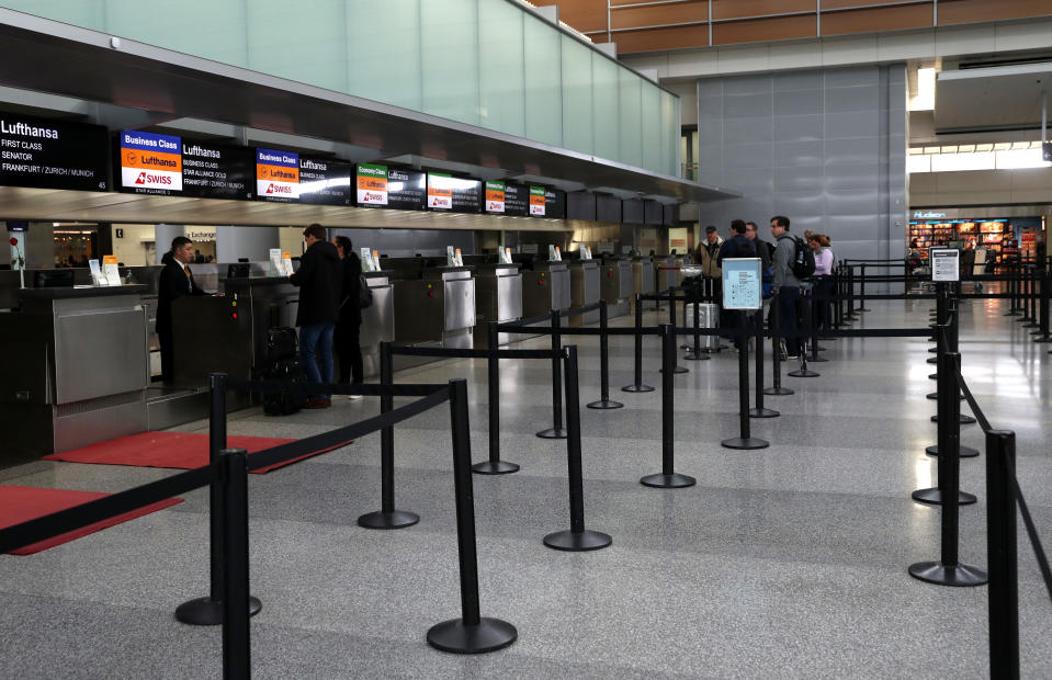 Ticket counters were nearly empty in the international terminal at San Francisco International Airport recently, in the wake of the COVID-19 outbreak. What if you want to cancel, too? (Photo: Justin Sullivan/Getty Images)