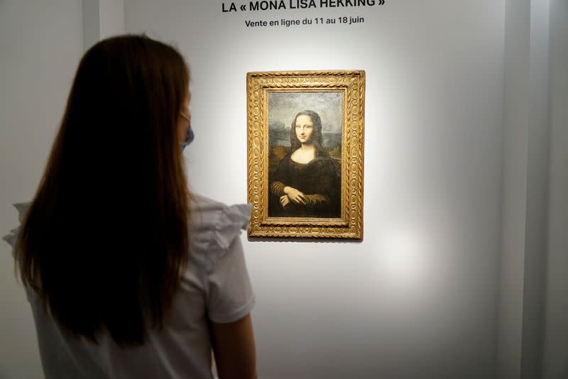 Reproduction of Leonardo da Vinci's Mona Lisa on display at Christie's auction house in Paris