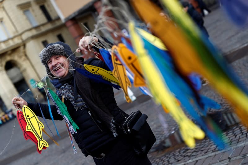 Protesters attend a demonstration held by "the sardines", a grassroots movement against far-right League leader Matteo Salvini, in Bologna