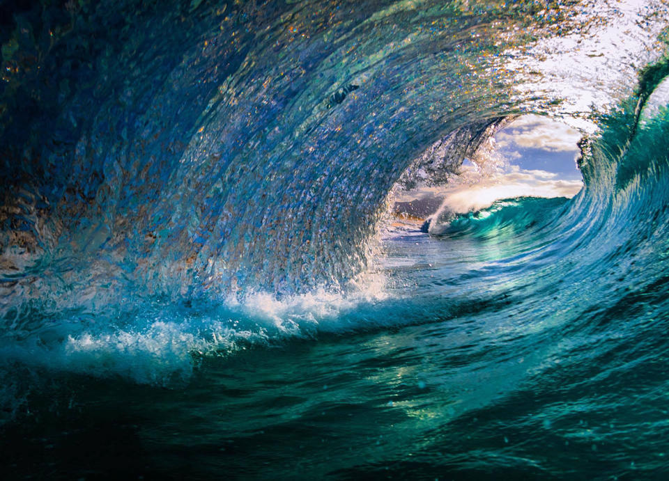 Smooth waves bursting with color give inside view of surfer’s paradise