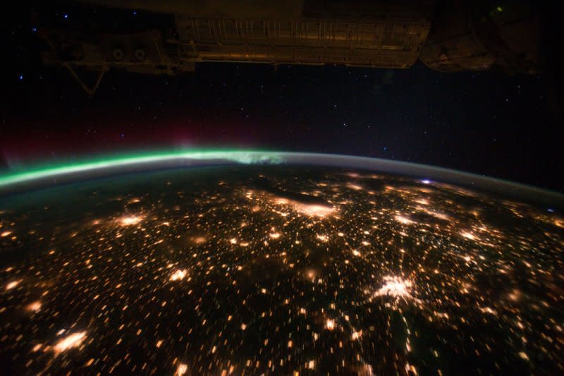 NOAA has issued a severe geomagnetic storm watch for Friday. It follows days of strong solar flares and coronal mass ejections. It could cause disruptions in power grids, radio, satellites and communications. It will also trigger spectacular Aurora Borealis light displays. Aurora Borealis seen in highlighting the Chicago area from the International Space Station. File Photo by NASA/UPI