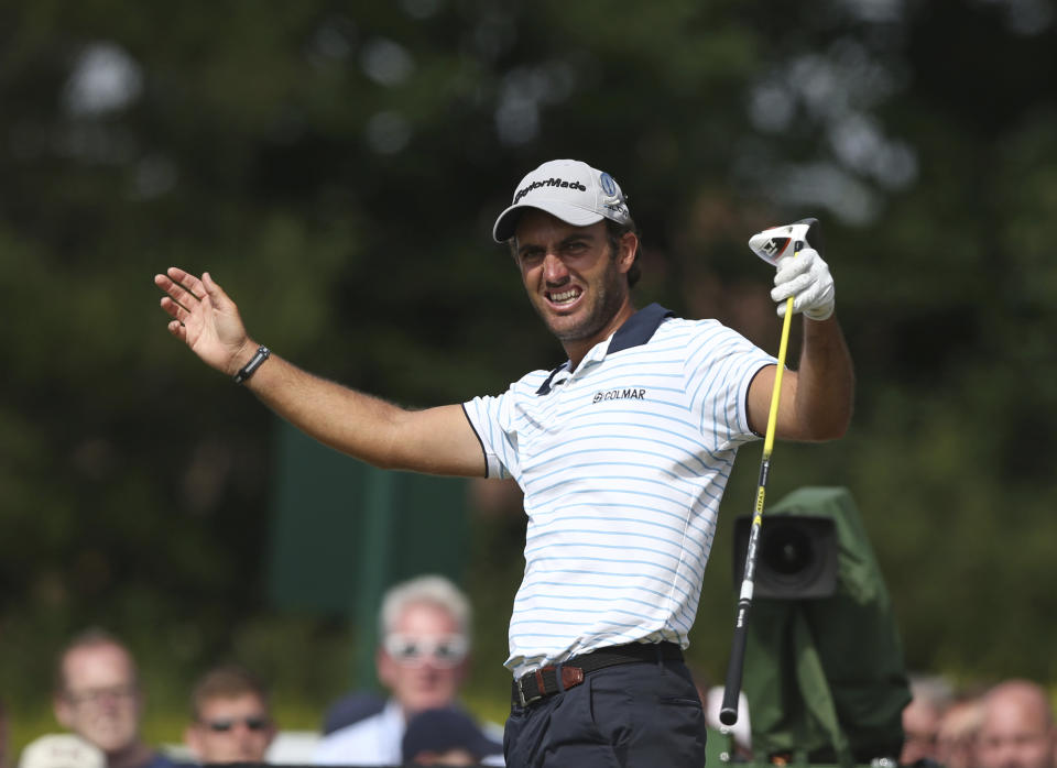 FILE - This Sunday July 20, 2014 file photo shows Edoardo Molinari of Italy at the British Open Golf championship at the Royal Liverpool golf club, Hoylake, England. Italian golfers Lorenzo Gagli and Edoardo Molinari have withdrawn from the Oman Open on the European Tour amid reports they are being isolated to determine if they have the virus spreading in Europe, Wednesday, Feb. 26, 2020. (AP Photo/Jon Super, File)