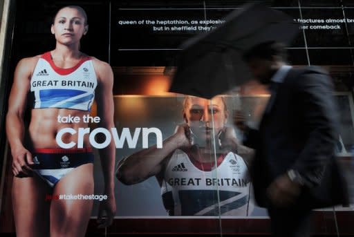 An advert featuring British athlete Jessica Ennis is seen in a shop window in central London. The opening day of the athletics programme of the Olympics on Friday has a distinctly British tinge with pin-up heptathlete Ennis and Welsh 400m hurdles world champion Dai Greene both figuring