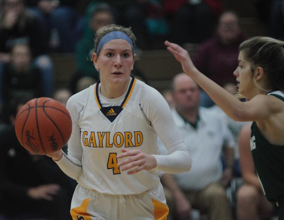 Meghan Keen moves the ball during a girls basketball matchup between Gaylord and Grayling on Tuesday, November 29.