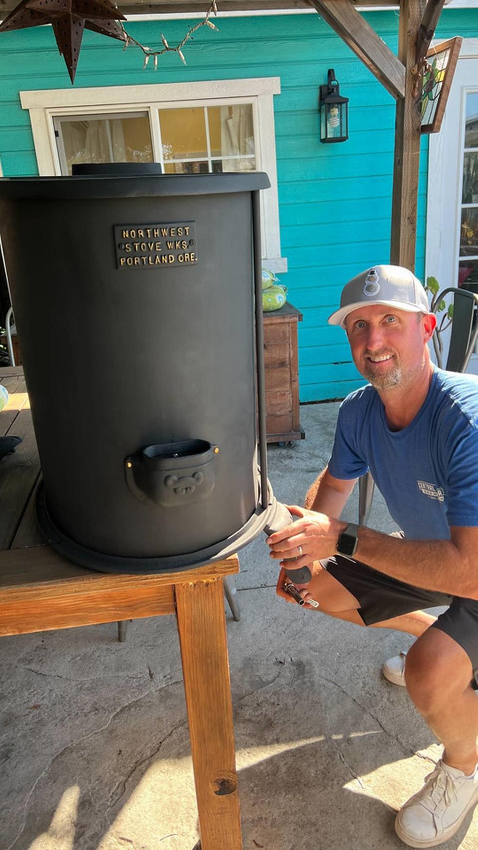 Brian Snow reinstalls a foot on a circa 1880s Northwest Stove Works heating unit that was in the old Santa Rosa School in Cambria for more than seven decades, then removed in 1952. Snow and his twin, Paul Snow, both raised in the northern San Luis Obispo County community, restored the stove and reinstalled it in the one-room schoolhouse in late October 2023.