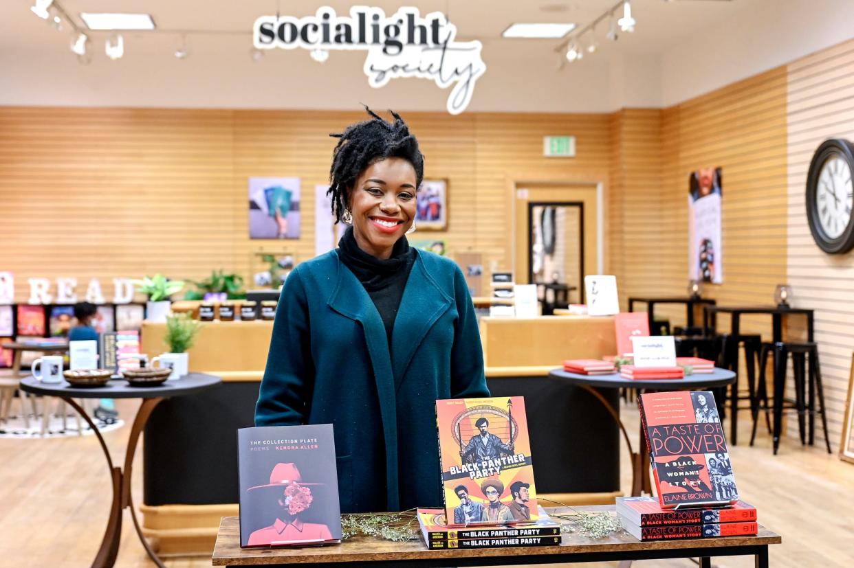 Nyshell Lawrence, owner of Socialight Society, photographed at her location inside the Lansing Mall on Monday, Jan. 31, 2022, in Lansing.