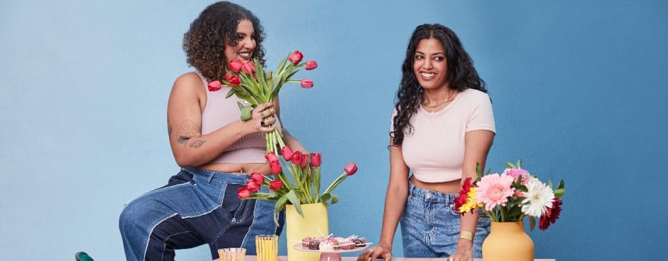 Women smiling with ProFlowers flowers