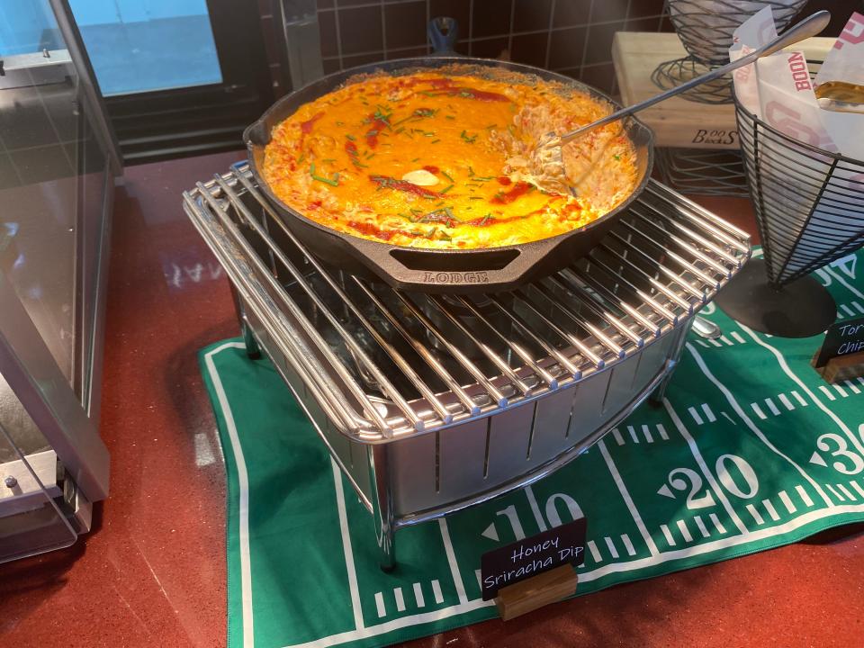 Honey sriracha chicken dip will be available for guests with tickets in the club levels at OU home football games beginning Sept. 2.