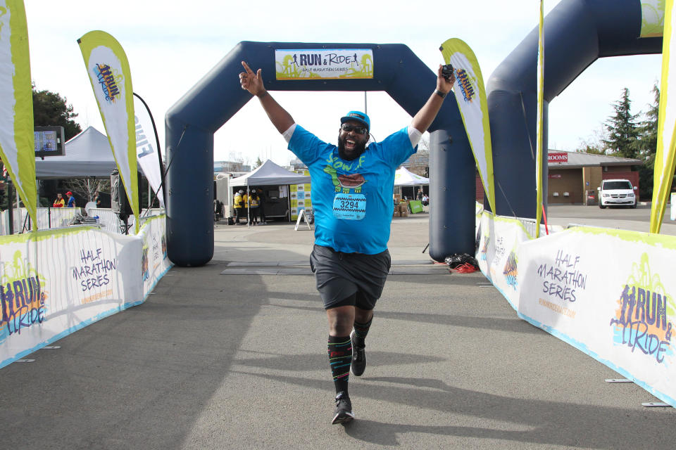 Evans crosses the finish line of the Snoopy Loopathon in December 2018. (Courtesy of Martinus Evans)