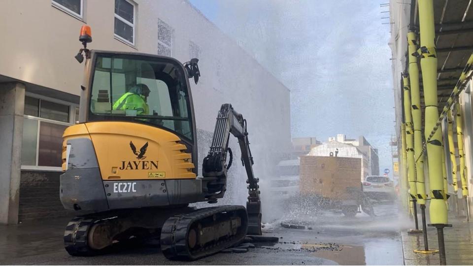 Jersey Water engineers repair a burst water main