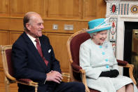 <p>Queen Elizabeth and the Duke of Edinburgh smile while they chat with the Taoiseach in Government Buildings while on the second day of their historic state visit to Ireland - the first visit by a reigning monarch to the republic.</p> 