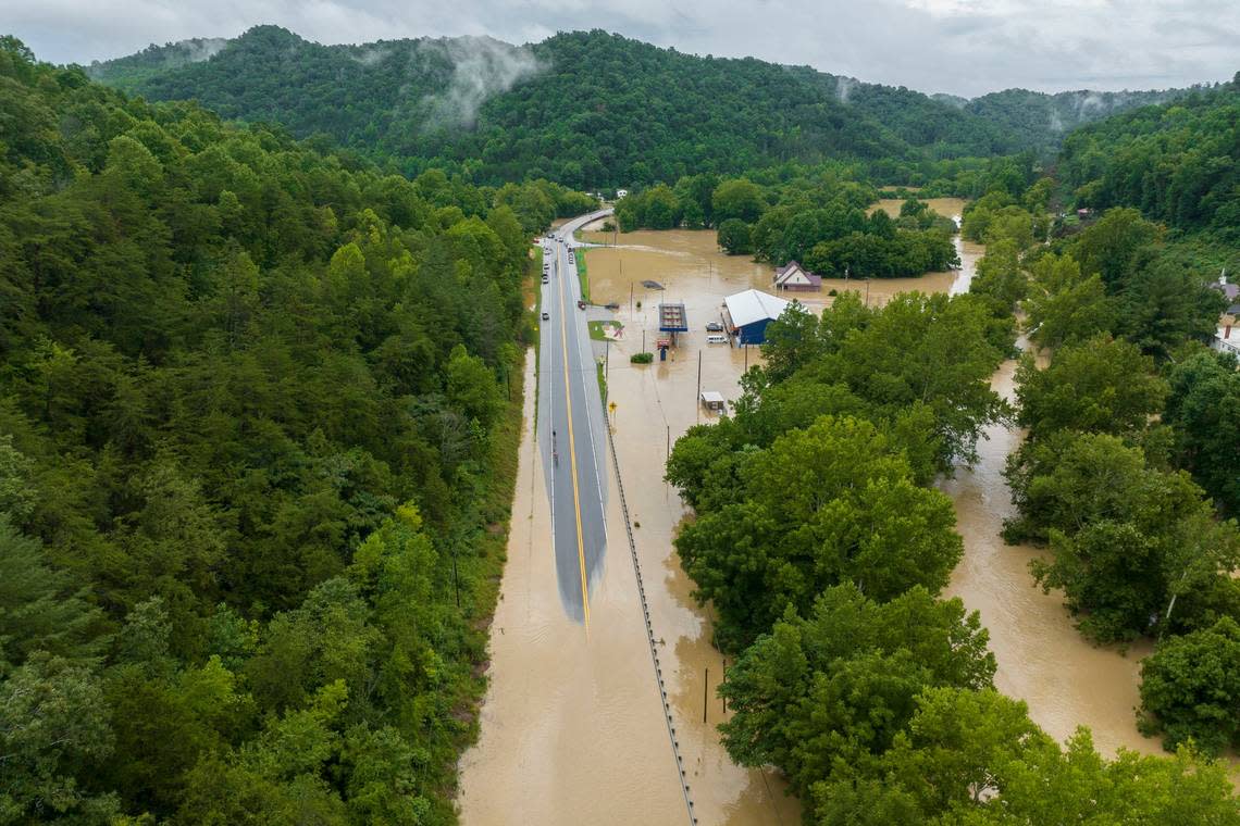 Buildings and roads are flooded near Lost Creek, Ky., Thursday, July 28, 2022.