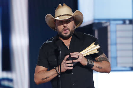 54th Academy of Country Music Awards- Show - Las Vegas, Nevada, U.S., April 7, 2019 - Jason Aldean accepts the ACM Dick Clark artist of the decade award. REUTERS/Mario Anzuoni