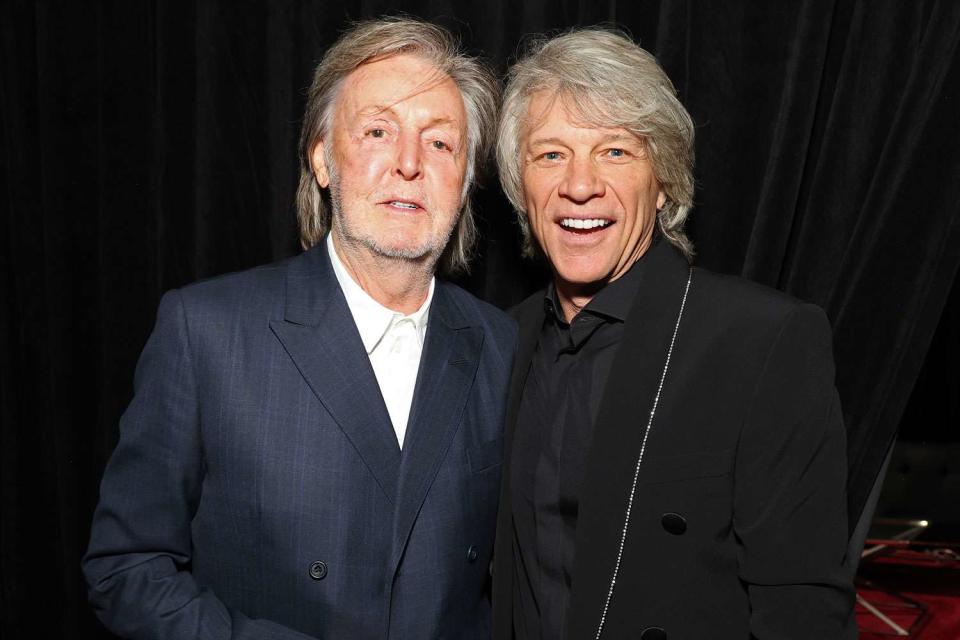 <p>Kevin Mazur/Getty</p> Paul McCartney and Jon Bon Jovi 