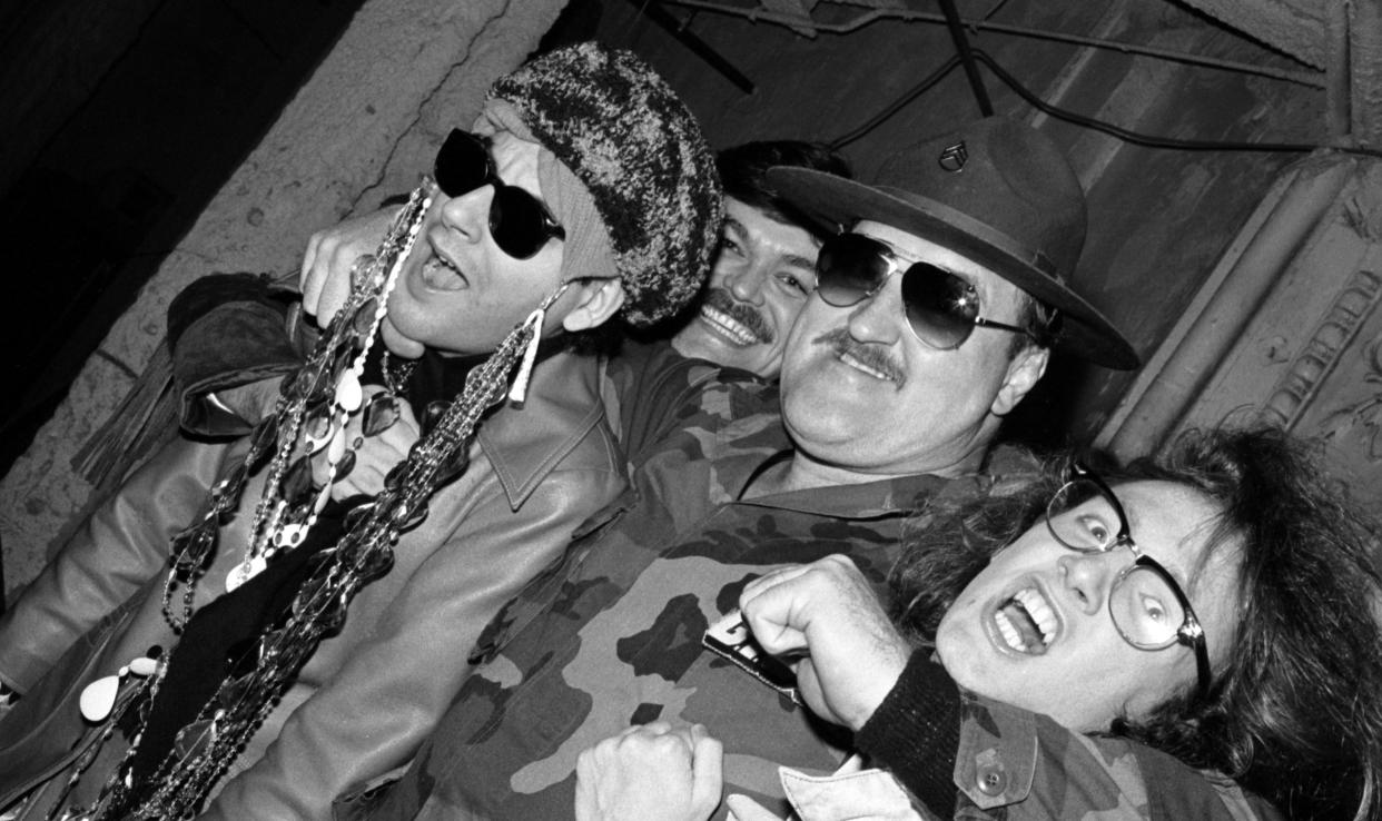 A vintage photograph of Michael Musto, Randy Jones of the Village People, professional wrestler Sgt. Slaughter and James St. James in a nightclub.