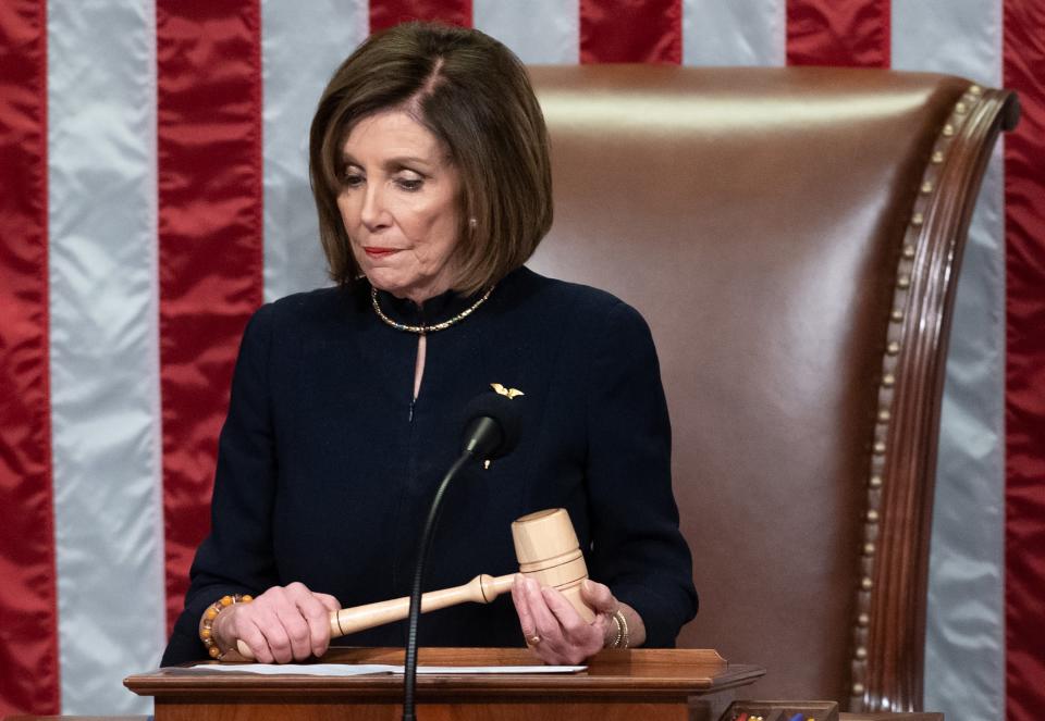 House Speaker Nancy Pelosi presides over Articles of Impeachment in Washington, DC, on Dec. 18, 2019.