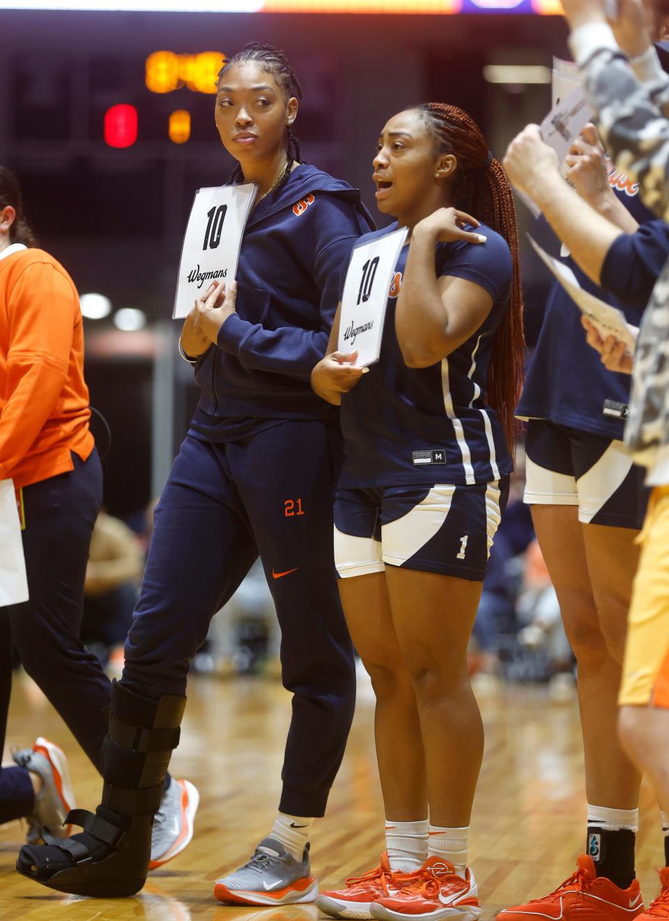 Saniaa Wilson (L) and Kennedi Perkins were part of the judges panel during the dunk contest.