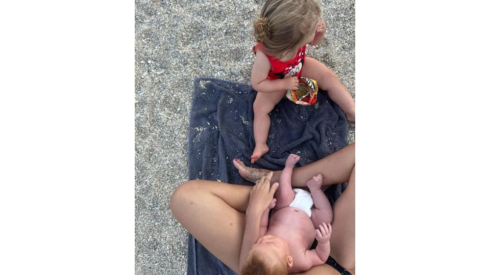 A photo of newborn baby Frankie on holiday with mum Carrie and sister Romy 