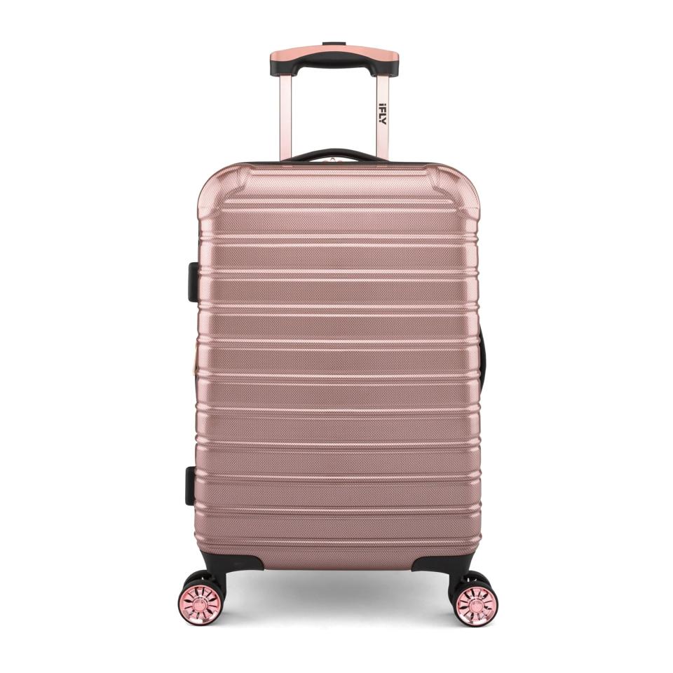 <p><a href="https://go.redirectingat.com?id=74968X1596630&url=https%3A%2F%2Fwww.walmart.com%2Fip%2FiFLY-Hardside-Fibertech-Carry-On-Luggage-20-Rose-Gold%2F264608430%3Ffrom%3D%252Fbrowse%252F%255B...seo%255D&sref=https%3A%2F%2Fwww.thepioneerwoman.com%2Fhome-lifestyle%2Fg43904720%2Fbest-walmart-luggage-deals%2F" rel="nofollow noopener" target="_blank" data-ylk="slk:Shop Now;elm:context_link;itc:0;sec:content-canvas" class="link ">Shop Now</a></p><p>iFLY Hardside Fibertech Carry-On Luggage</p><p>$88.00</p><span class="copyright">Walmart</span>