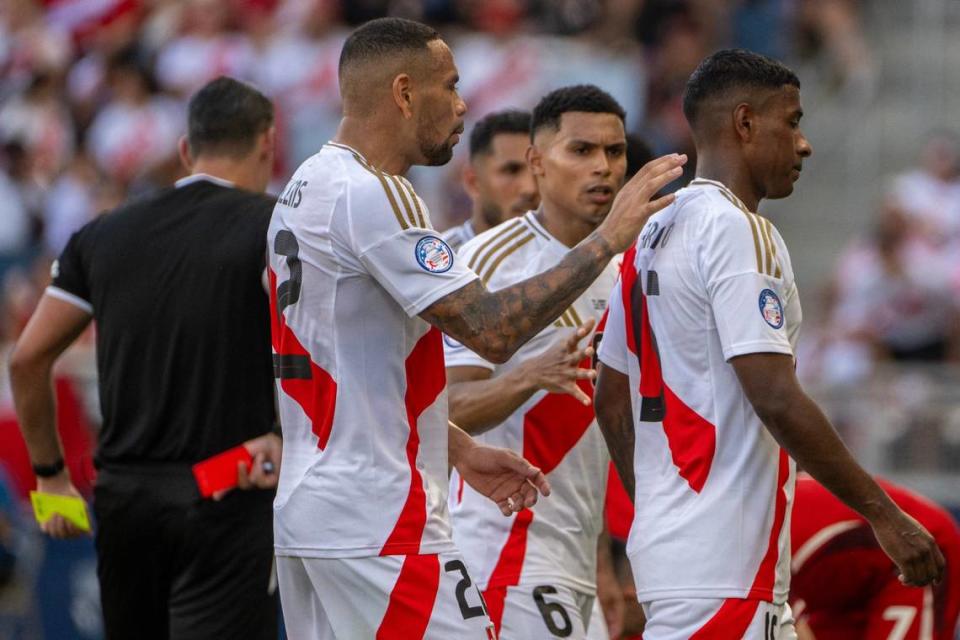 Peru defender Miguel Araujo (15) receives a red card in the second half of a Copa America match against Canada Tuesday at Children’s Mercy Park.