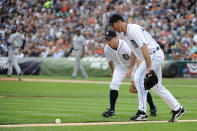DETROIT, MI - OCTOBER 13: Justin Verlander #35 and Brandon Inge #15 of the Detroit Tigers watch as a ball stays fair on a hit by Elvis Andrus #1 of the Texas Rangers in Game Five of the American League Championship Series at Comerica Park on October 13, 2011 in Detroit, Michigan. (Photo by Harry How/Getty Images)