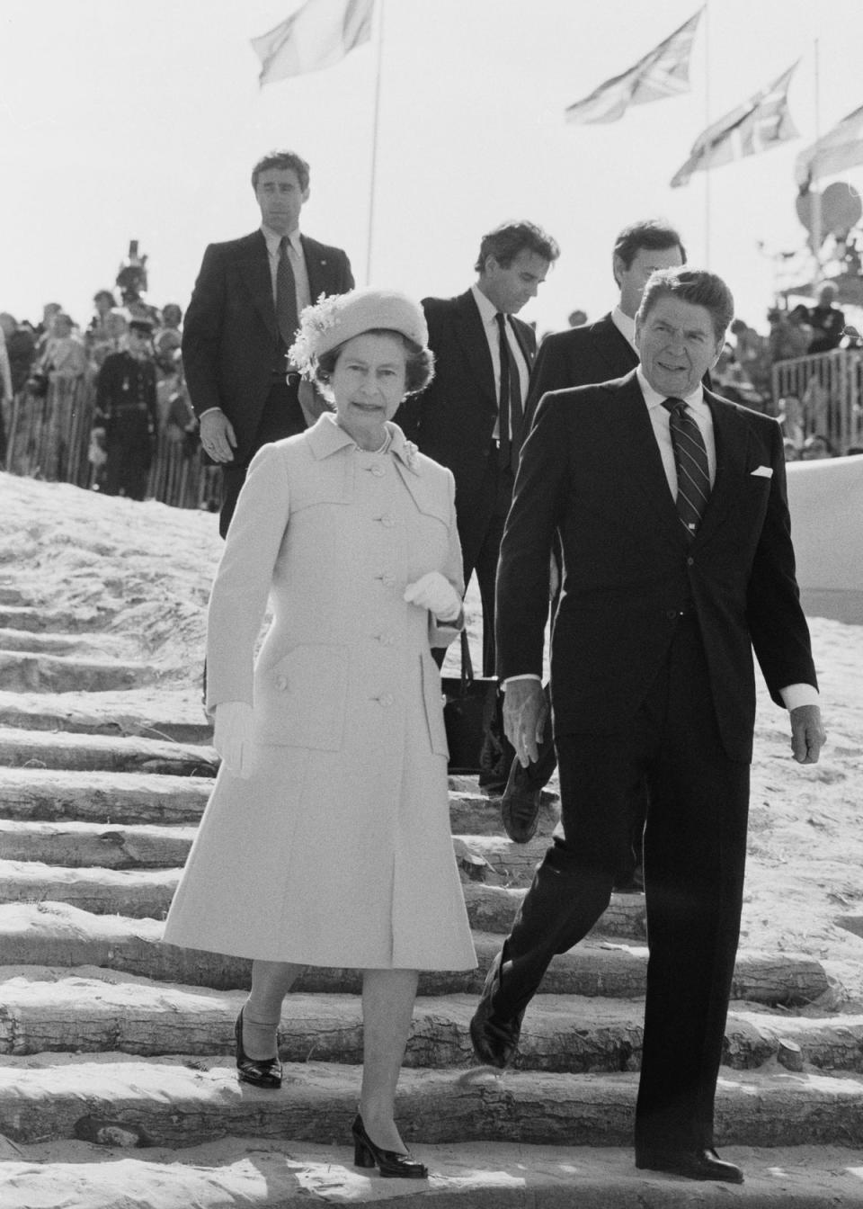 Queen Elizabeth and Ronald Reagan commemorating the 40th anniversary of D-Day, Normandy, 1984 (Getty)