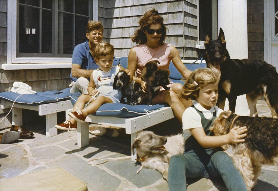 President John F. Kennedy, first lady Jacqueline Kennedy, and their children, John Jr. and Caroline, on vacation in Hyannis Port, Massachusetts.