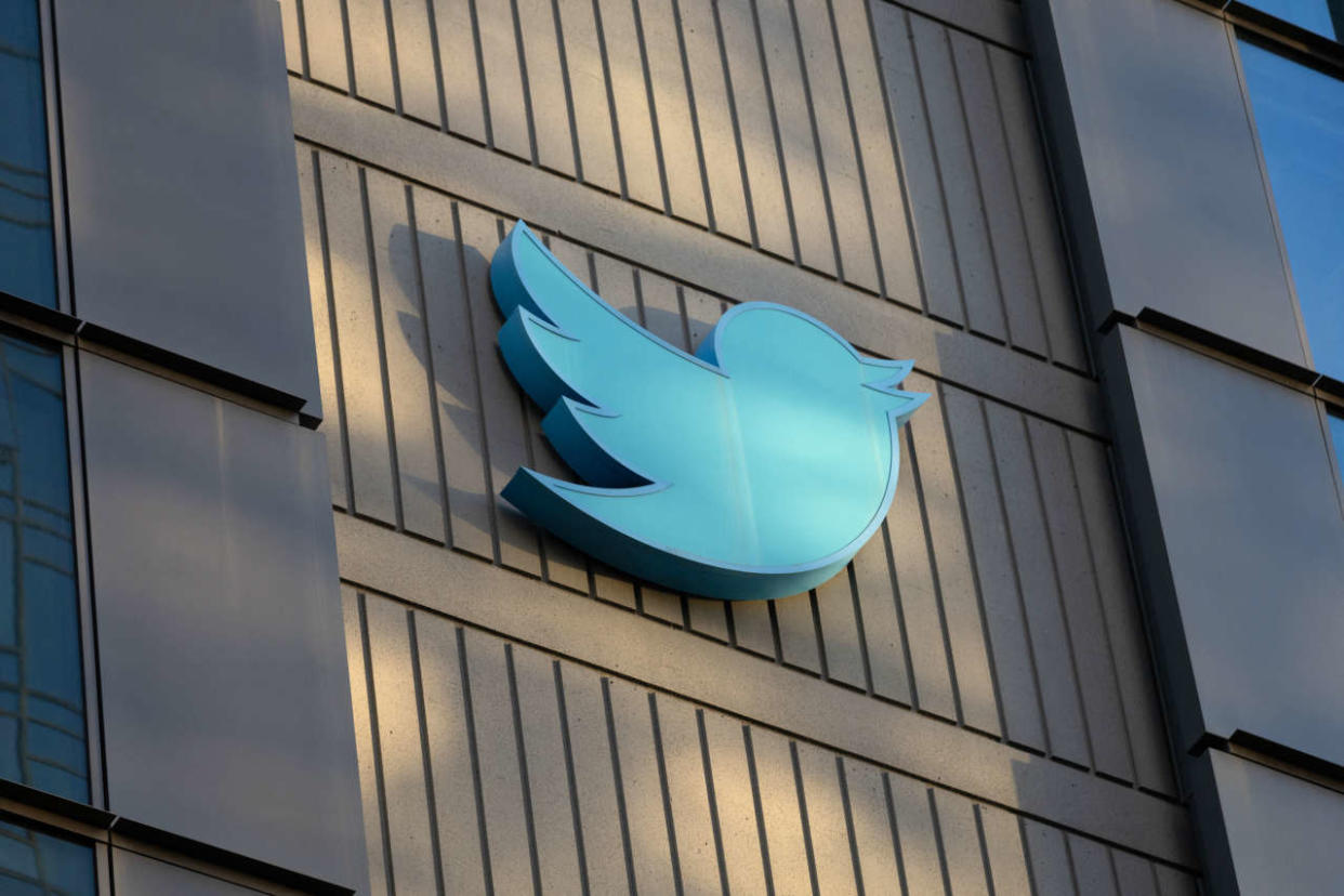 (FILES) In this file photo taken on October 28, 2022, the Twitter logo is seen on the exterior of Twitter headquarters in San Francisco, California. - An organized trolling campaign tweeting slurs tens of thousands of times tested Twitter's moderation policies after the platform was taken over by billionaire Elon Musk, its safety chief said October 29, 2022, adding that the rules 