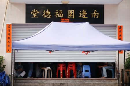 Demonstrators march to protest against the Yuen Long attacks in Yuen Long