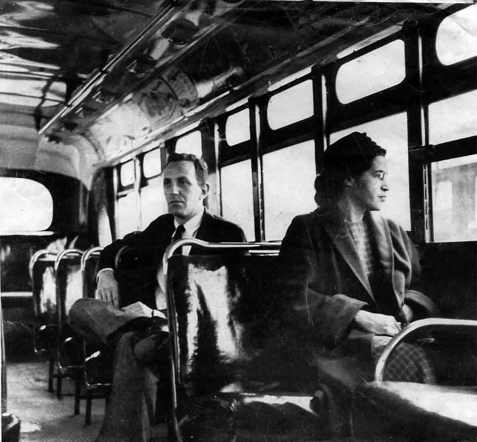 An undated photo shows Rosa Parks riding on the Montgomery Area Transit System bus. Parks refused to give up her seat on a Montgomery bus on Dec. 1, 1955, and ignited a boycott that led to a federal court ruling against segregation in public transportation.