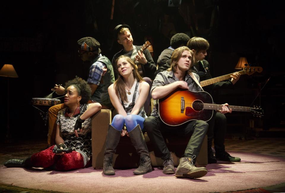 This publicity photo released by Richard Kornberg & Associates shows, front row, from left, Nathaly Lopez, Laura Dreyfuss and Karl Riabko, and, back row, from left, James Williams, James Nathan Hopkins, Daniel Woods and Daniel Bailen, in “What’s It All About? Bacharach Reimagined," currently performing off-Broadway at New York Theatre Workshop in New York. (AP Photo/Richard Kornberg & Associates, Joan Marcus)