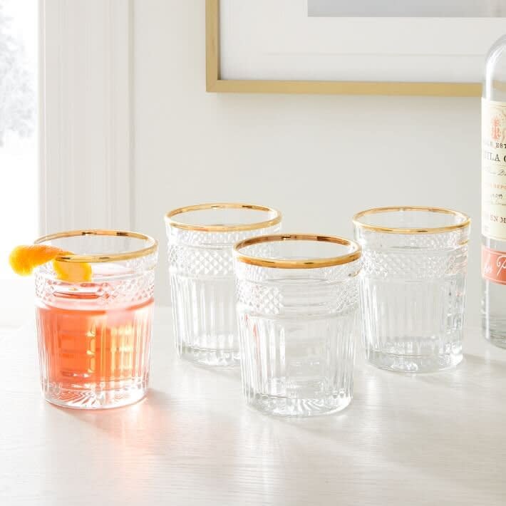 Let a loved one drink in style with this set of gold-trimmed glasses, which look like they came from the '20s. <a href="https://fave.co/2JWicLR" target="_blank" rel="noopener noreferrer">Find the set of four for $50 at West Elm</a>.