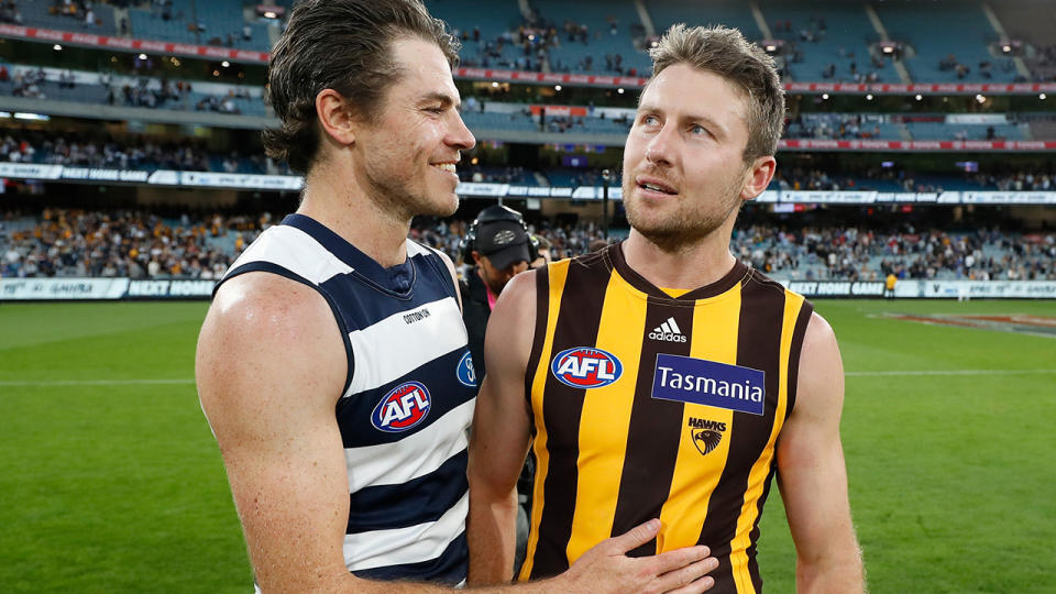 Isaac Smith and Luke Breust, pictured here after Geelong's win over Hawthorn. 